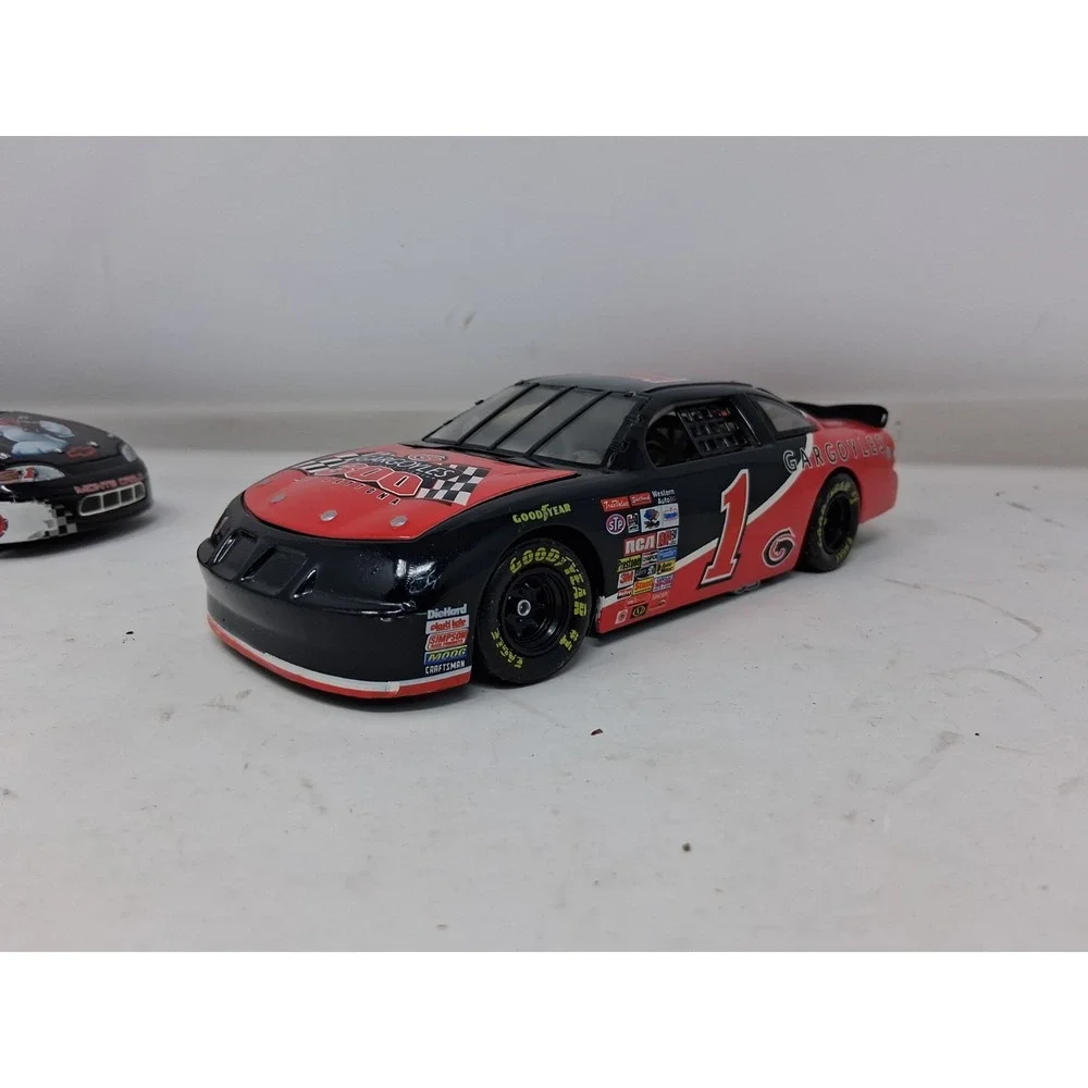 1:24 Action Dale Earnhardt/Coca Cola 1998 Monte Carlo + 1997 Gargoyles Pontiac H